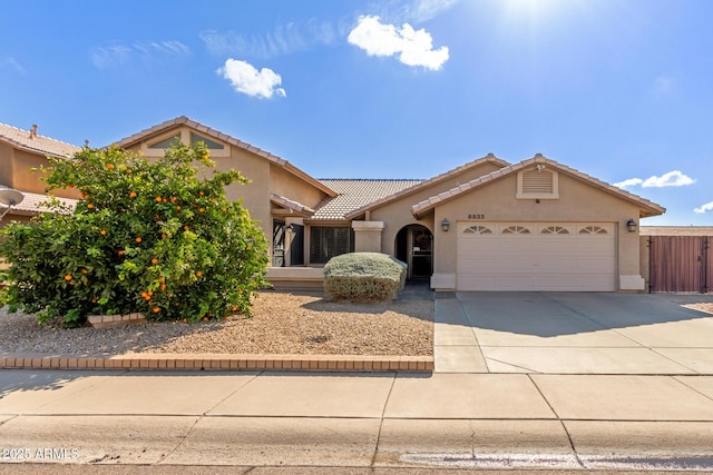 view of front of home featuring a garage