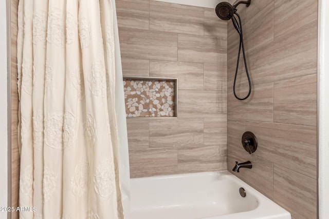 bathroom featuring shower / bath combo with shower curtain