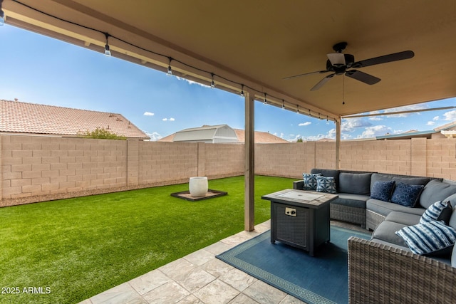 view of patio featuring an outdoor hangout area and ceiling fan