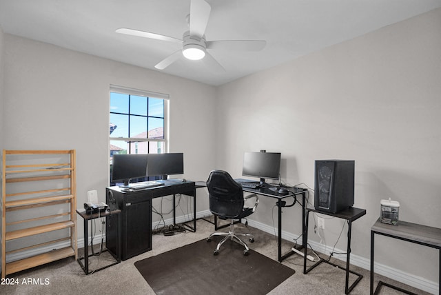 office with light colored carpet and ceiling fan