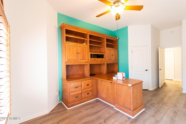 office with ceiling fan and wood-type flooring