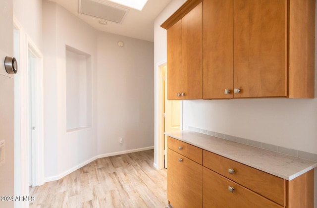 kitchen with light hardwood / wood-style floors