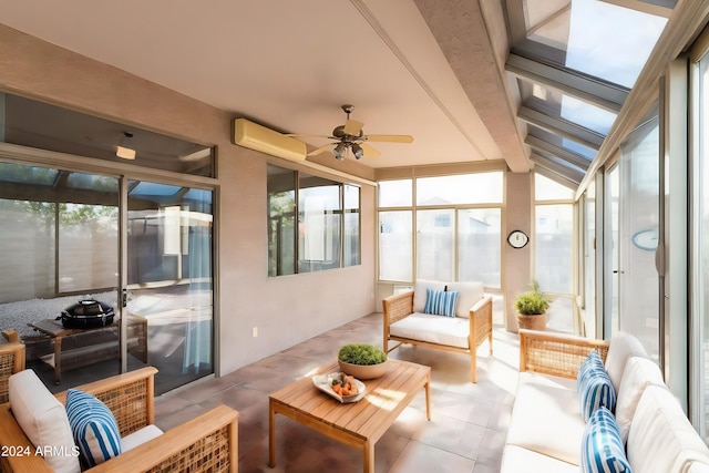 sunroom / solarium featuring ceiling fan, vaulted ceiling, and a wall mounted AC