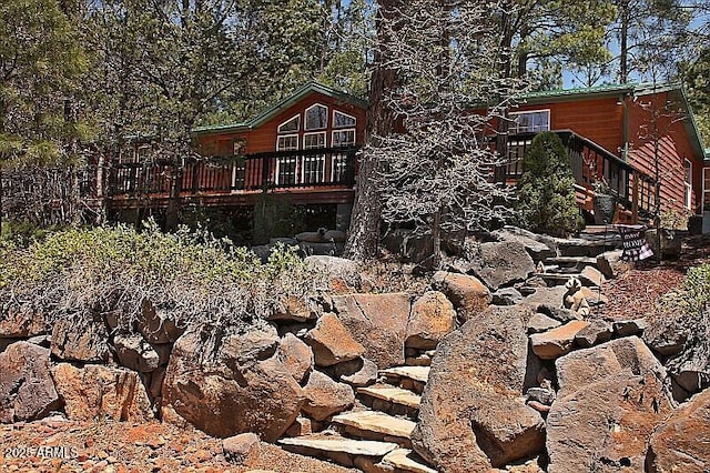 1181 S Cherokee Dr, Show Low, AZ 85901 - rear view of house with a wooden deck