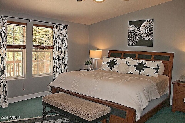 1181 S Cherokee Dr, Show Low, AZ 85901 - carpeted bedroom featuring multiple windows, baseboards, and vaulted ceiling