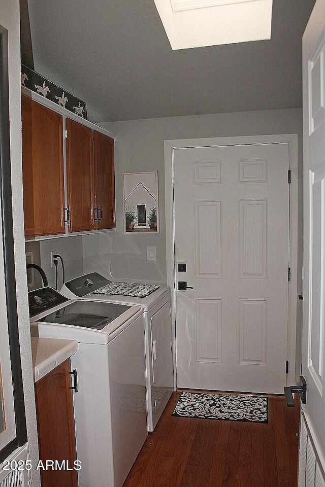 1181 S Cherokee Dr, Show Low, AZ 85901 - laundry area featuring cabinet space, washer and dryer, dark wood finished floors, and a skylight