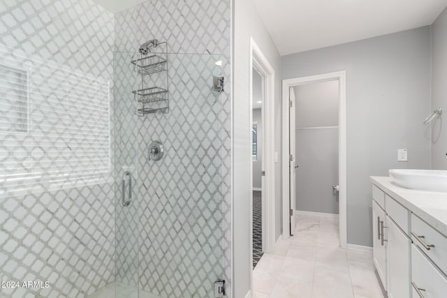 bathroom featuring vanity and walk in shower