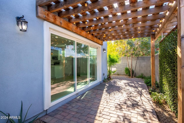 view of patio / terrace featuring a pergola