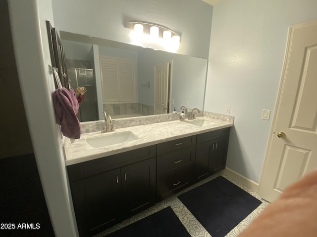 bathroom with vanity and walk in shower