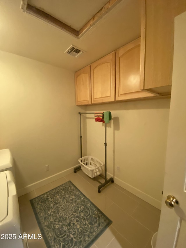 washroom featuring tile patterned flooring