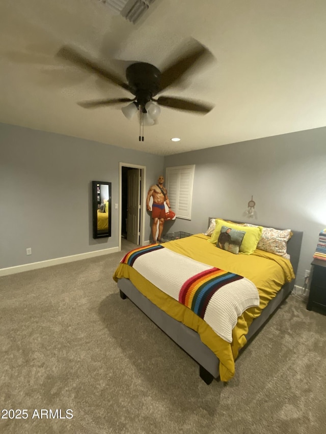 carpeted bedroom featuring ceiling fan