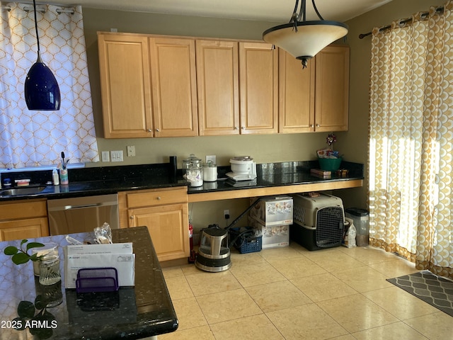 kitchen with decorative light fixtures, light brown cabinets, light tile patterned floors, dishwasher, and dark stone counters