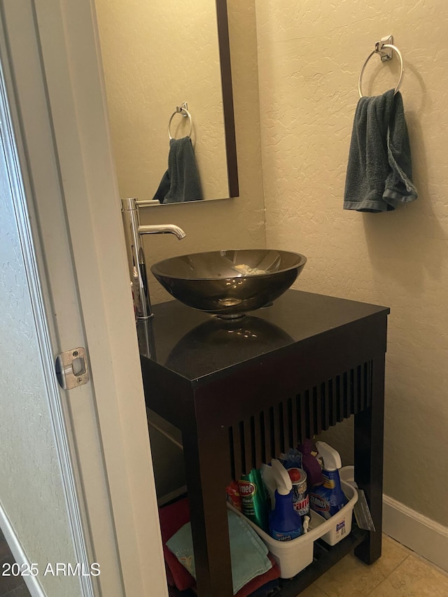 bathroom with vanity and tile patterned floors