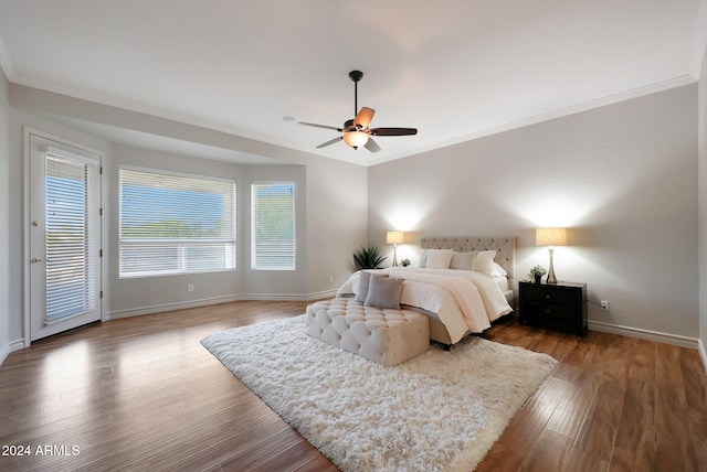 bedroom with ceiling fan, crown molding, access to exterior, and hardwood / wood-style floors