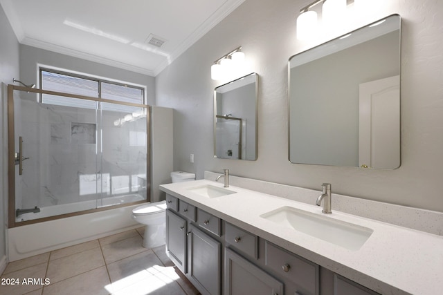 full bathroom with toilet, ornamental molding, vanity, and shower / bath combination with glass door