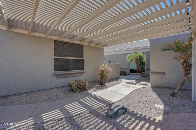 view of patio featuring a pergola