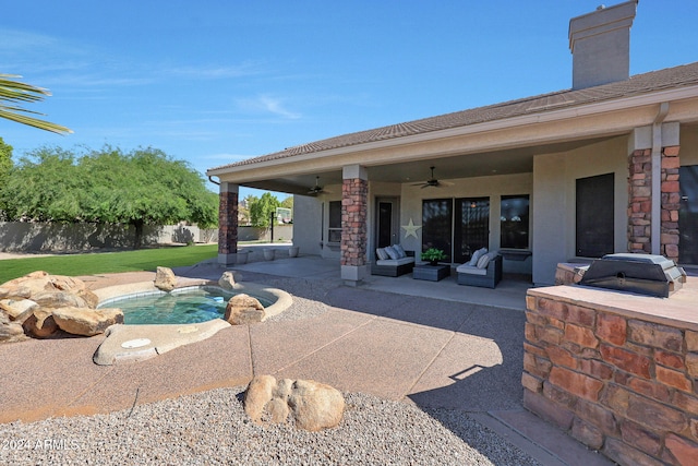 view of pool featuring a patio, grilling area, and ceiling fan