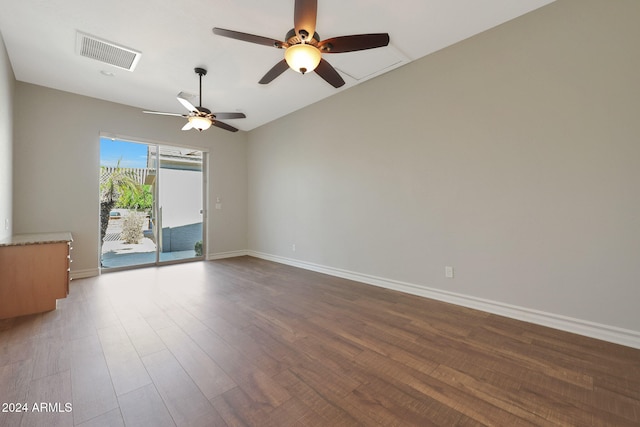 unfurnished room with wood-type flooring and ceiling fan