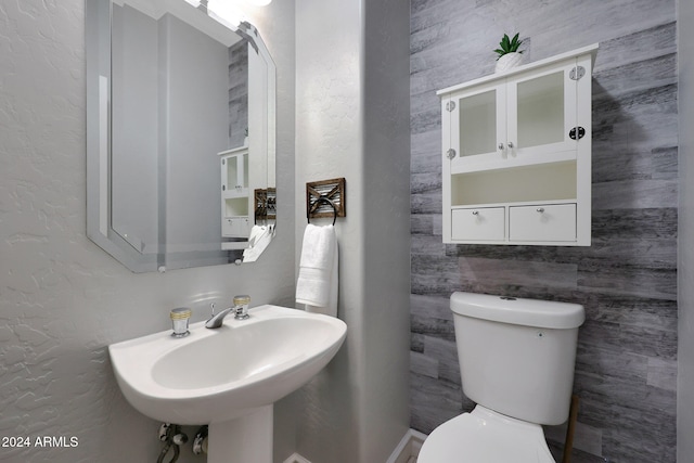 bathroom with toilet and sink