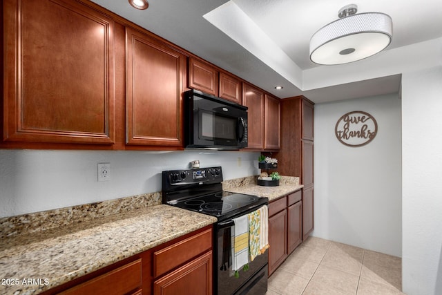 8500 E Indian School Rd Unit 233, Scottsdale, AZ 85251 - kitchen with black appliances, light tile patterned floors, light stone counters, and recessed lighting