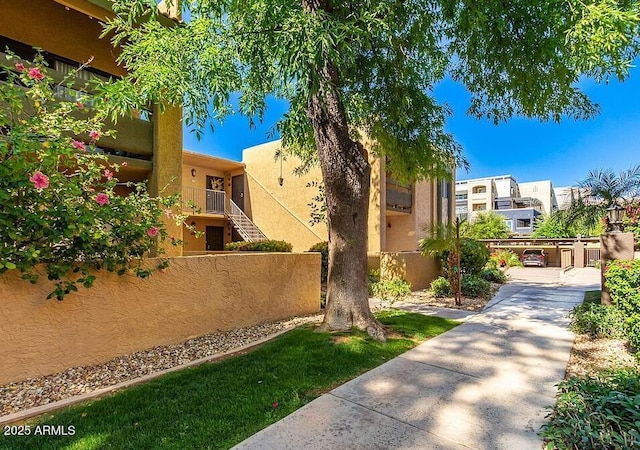 8500 E Indian School Rd Unit 233, Scottsdale, AZ 85251 - view of side of property featuring stucco siding