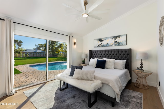 bedroom featuring wood-type flooring, access to outside, vaulted ceiling, and ornamental molding