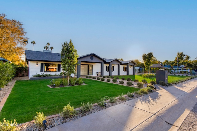 view of front of house with a front yard