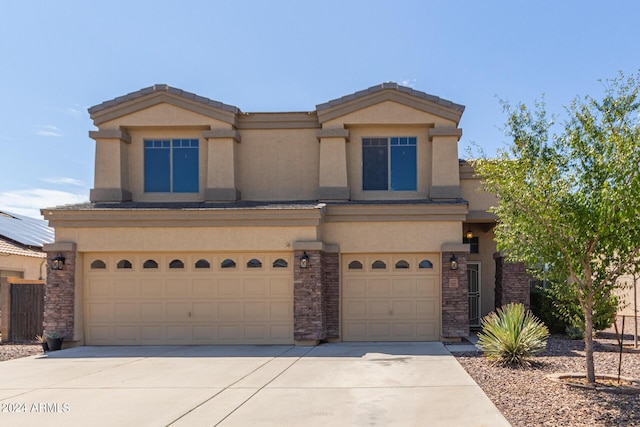 view of front of home with a garage