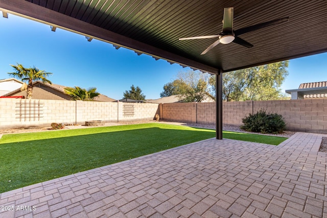 view of patio with ceiling fan