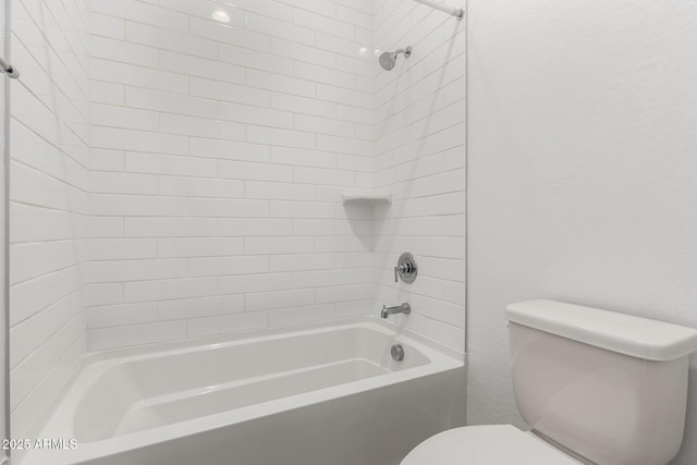 bathroom featuring toilet and shower / bath combination