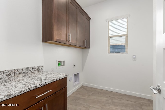 laundry area with washer hookup, cabinets, and hookup for an electric dryer