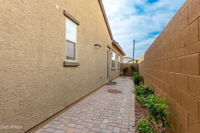 view of home's exterior with a patio