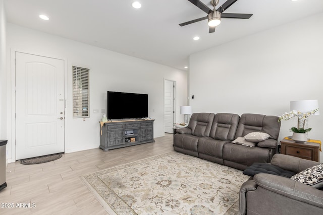 living room featuring ceiling fan