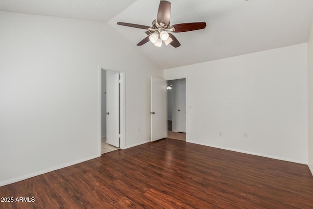 1425 E Commerce Ave, Gilbert, AZ 85234 - unfurnished bedroom with wood finished floors, lofted ceiling, and baseboards