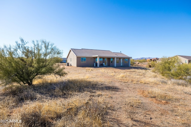 view of front of home featuring stucco siding