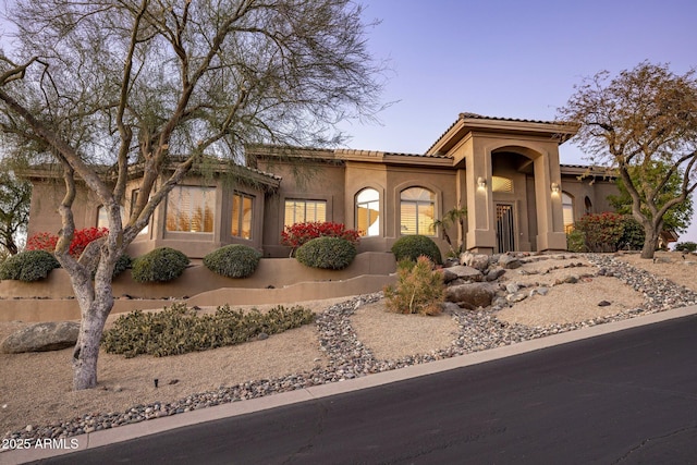 view of mediterranean / spanish-style house