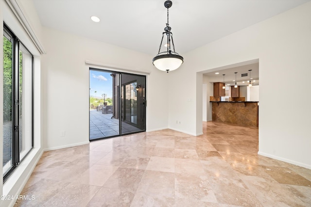 unfurnished room with a wealth of natural light