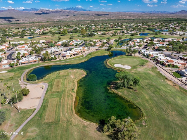 bird's eye view with a water and mountain view