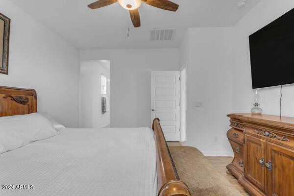 bedroom featuring ceiling fan