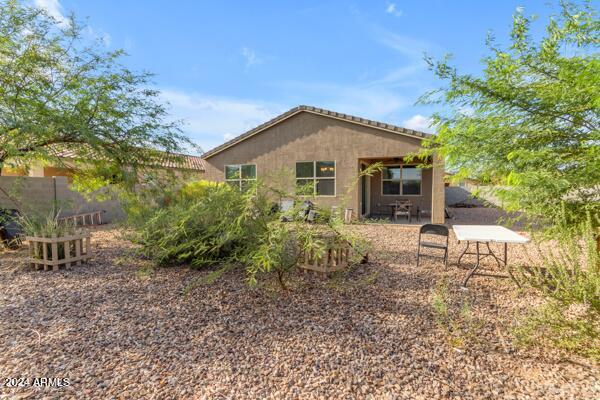 rear view of property with a patio