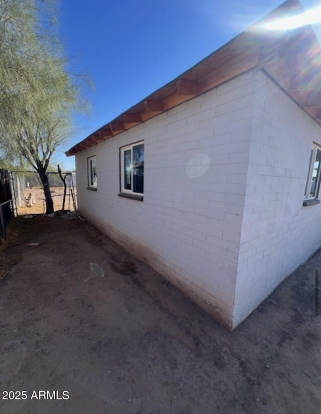 5031 S 36th Dr, Phoenix, AZ 85041 - view of side of home with fence