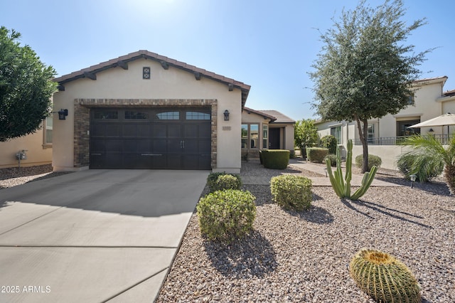 view of front facade featuring stucco siding, stone siding, concrete driveway, and an attached garage