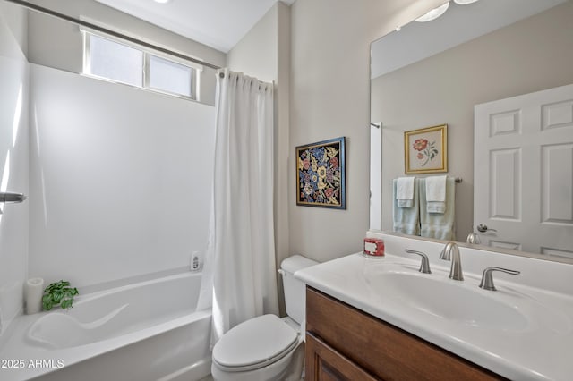 full bathroom featuring shower / bath combo with shower curtain, toilet, and vanity