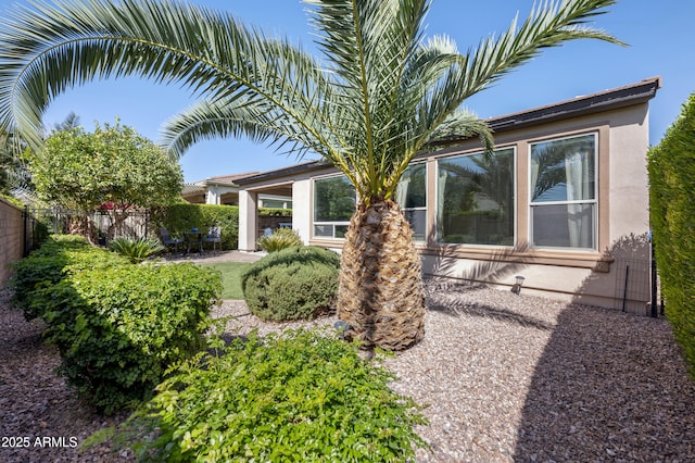 view of yard with a patio and fence