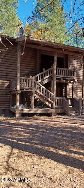 exterior space with a wooden deck