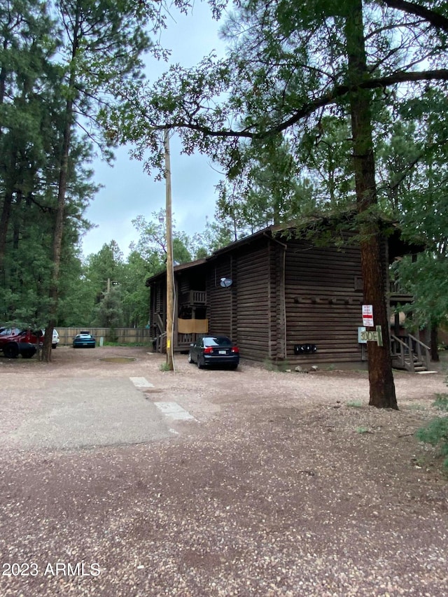 view of outdoor structure with a carport