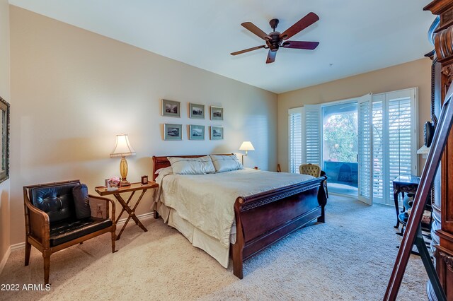 carpeted bedroom with access to outside and ceiling fan