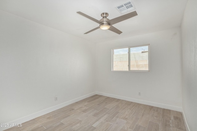 empty room featuring light hardwood / wood-style floors and ceiling fan