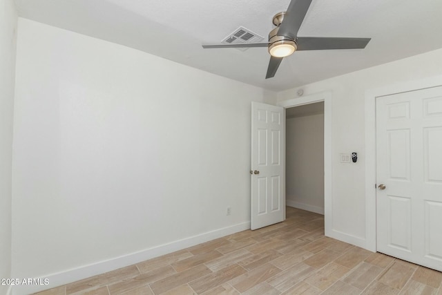 unfurnished bedroom featuring ceiling fan