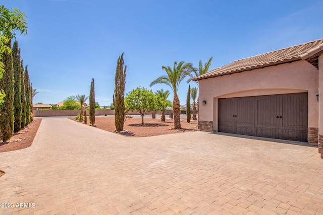 exterior space with a garage